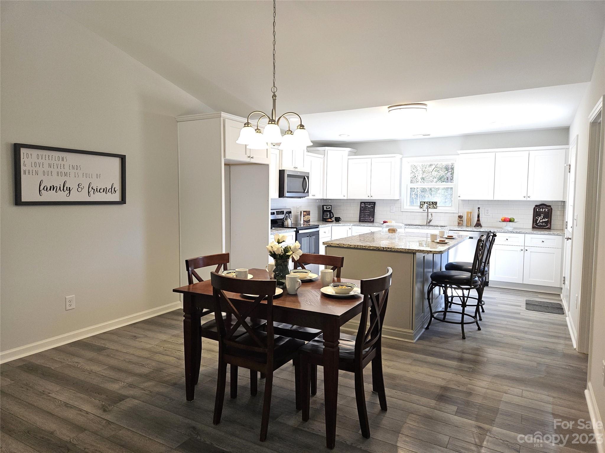 121 Hawkins Loop Salisbury, NC 28144 - Photo 3 of 31 a view of a dining room with furniture window and wooden floor