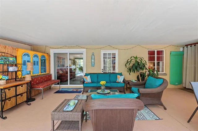 a view of outdoor space with seating area and trees