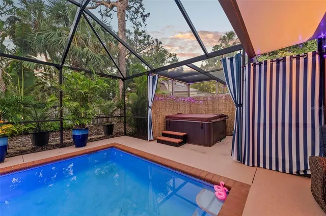 a living room with furniture a flat screen tv and a window