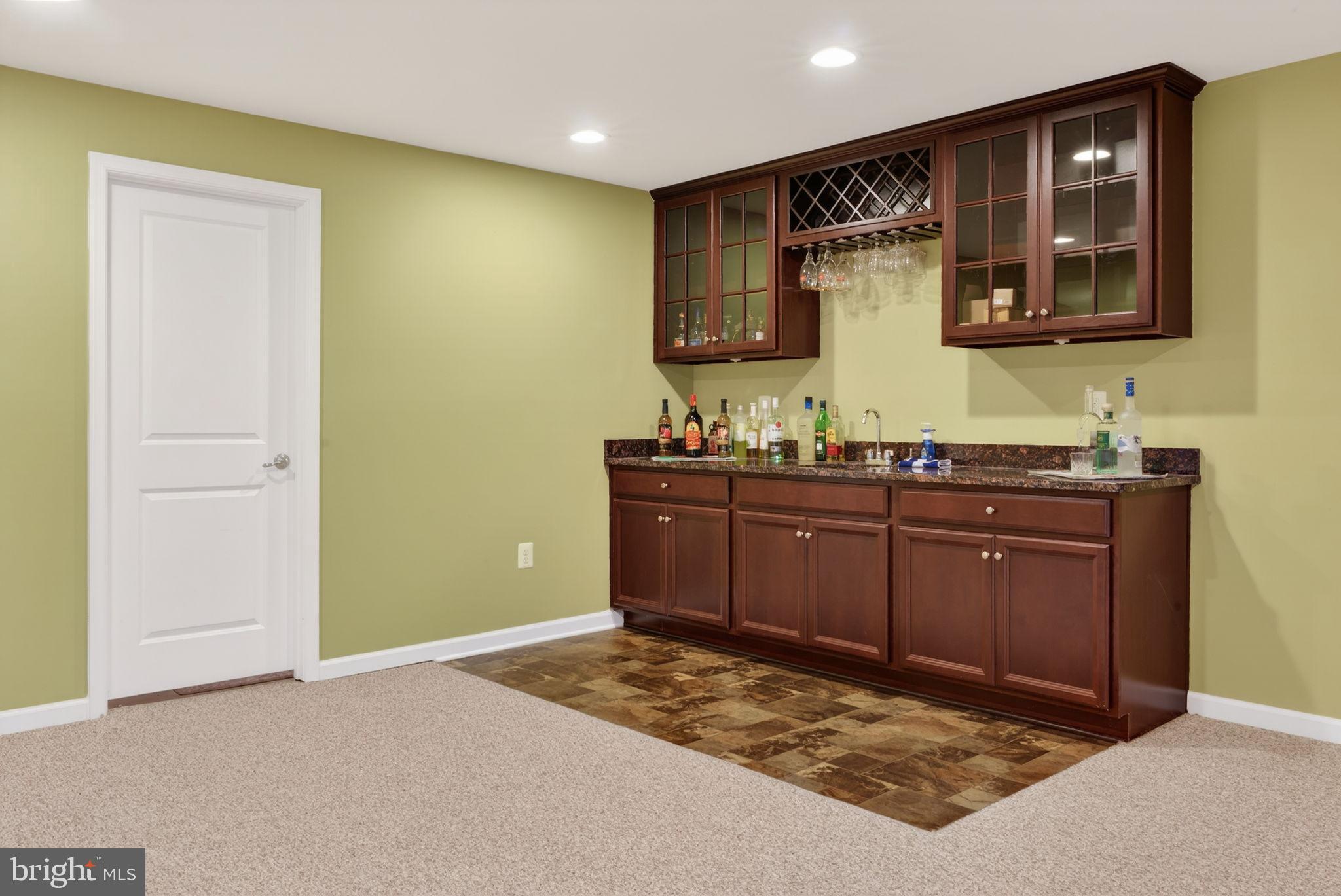 610 Kingsbrook Road Culpeper, VA 22701 - Photo 27 of 43 Elegant wet bar in a cozy basement retreat.