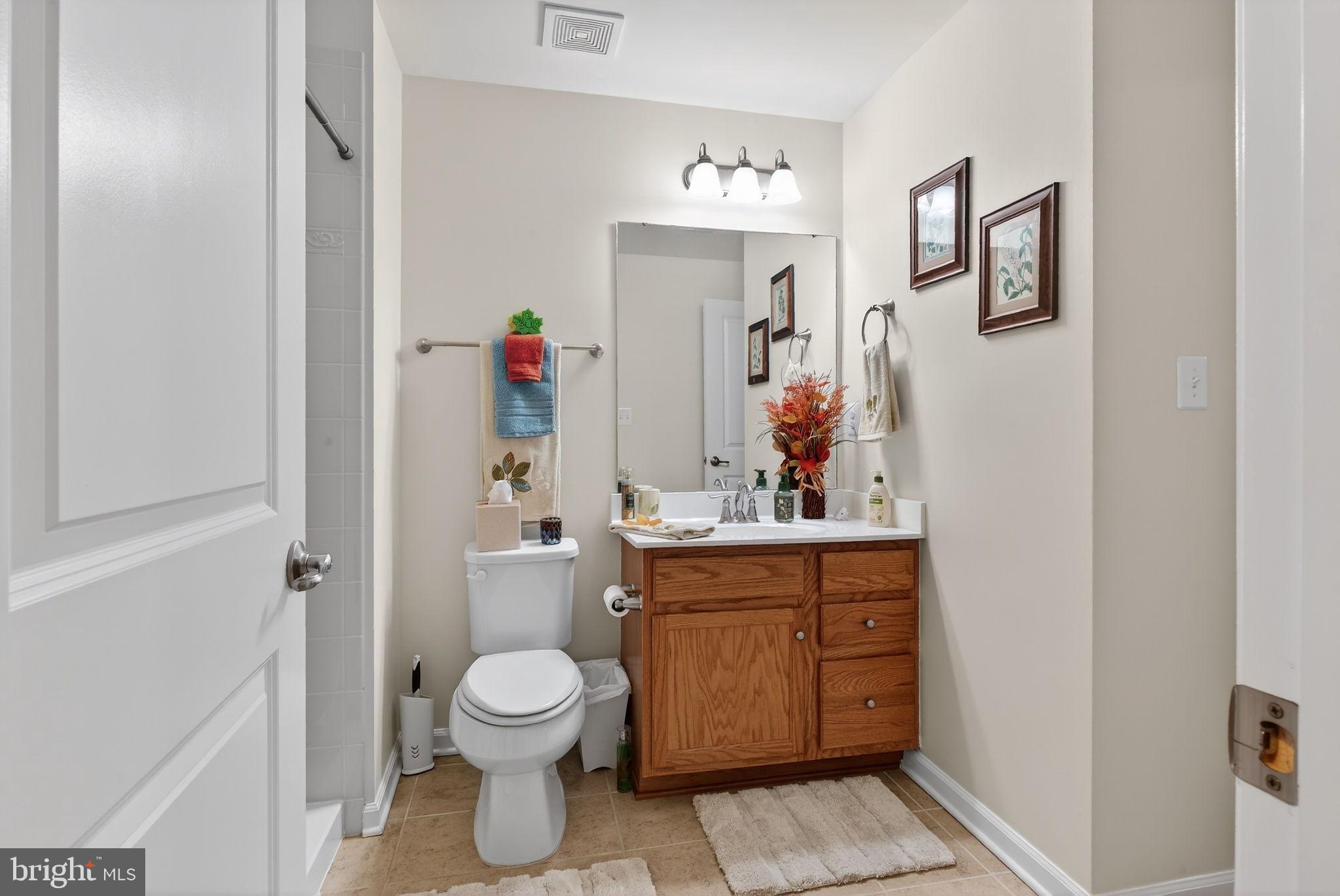 610 Kingsbrook Road Culpeper, VA 22701 - Photo 32 of 43 Charming bathroom with warm wooden accents.
