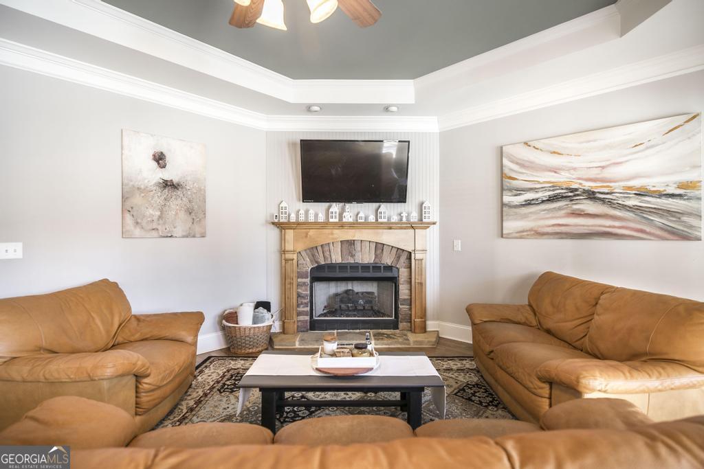 103 Westward Point Kathleen, GA 31047 - Photo 11 of 47 a living room with furniture fireplace and a flat screen tv