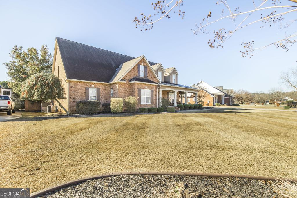 103 Westward Point Kathleen, GA 31047 - Photo 2 of 47 a house view with a outdoor space