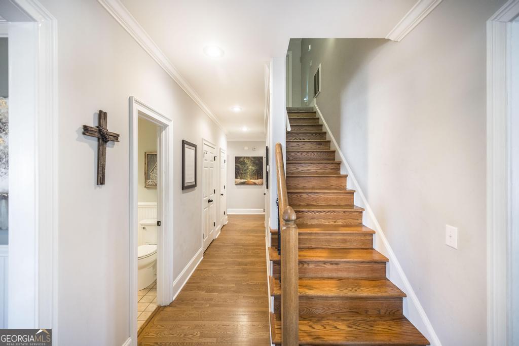 103 Westward Point Kathleen, GA 31047 - Photo 21 of 47 a view of a hallway with wooden floor and stairs