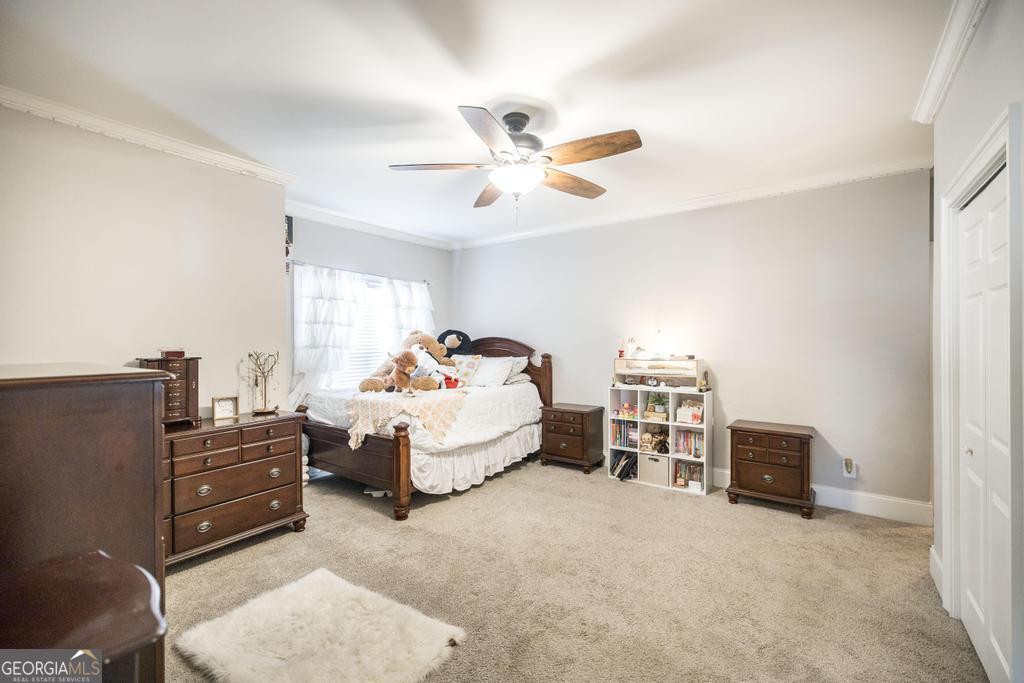 103 Westward Point Kathleen, GA 31047 - Photo 29 of 47 a bedroom with bed and window