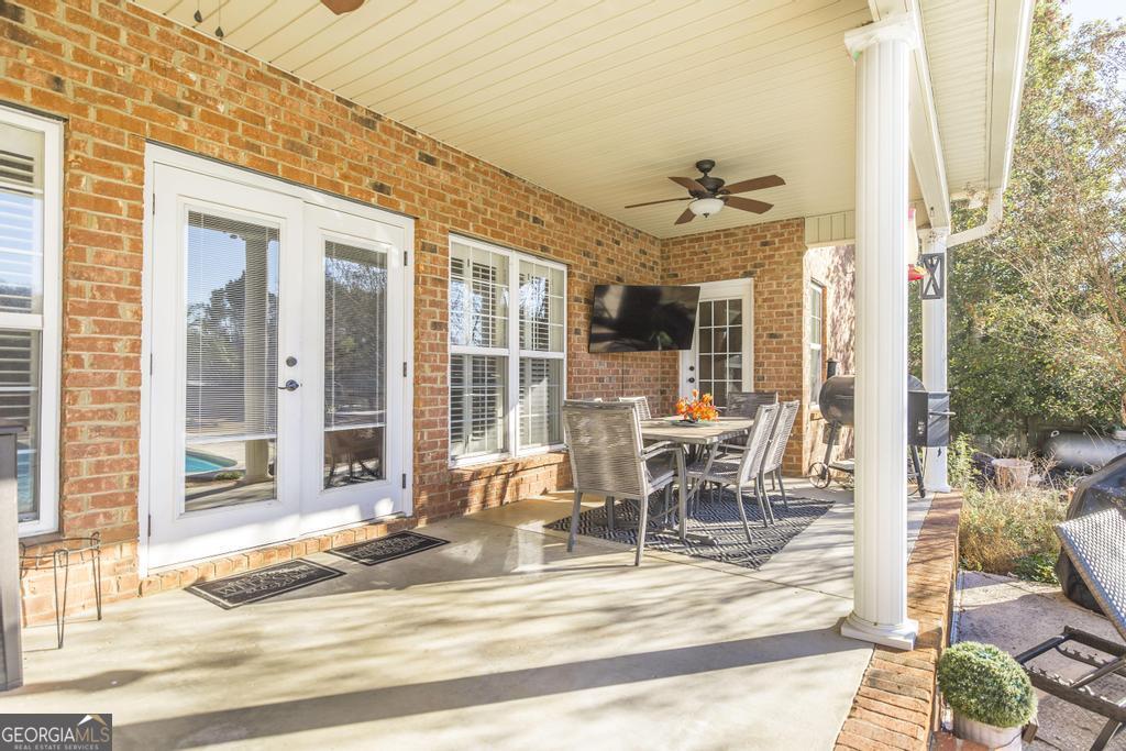 103 Westward Point Kathleen, GA 31047 - Photo 39 of 47 a view of a dining room with a table and chairs