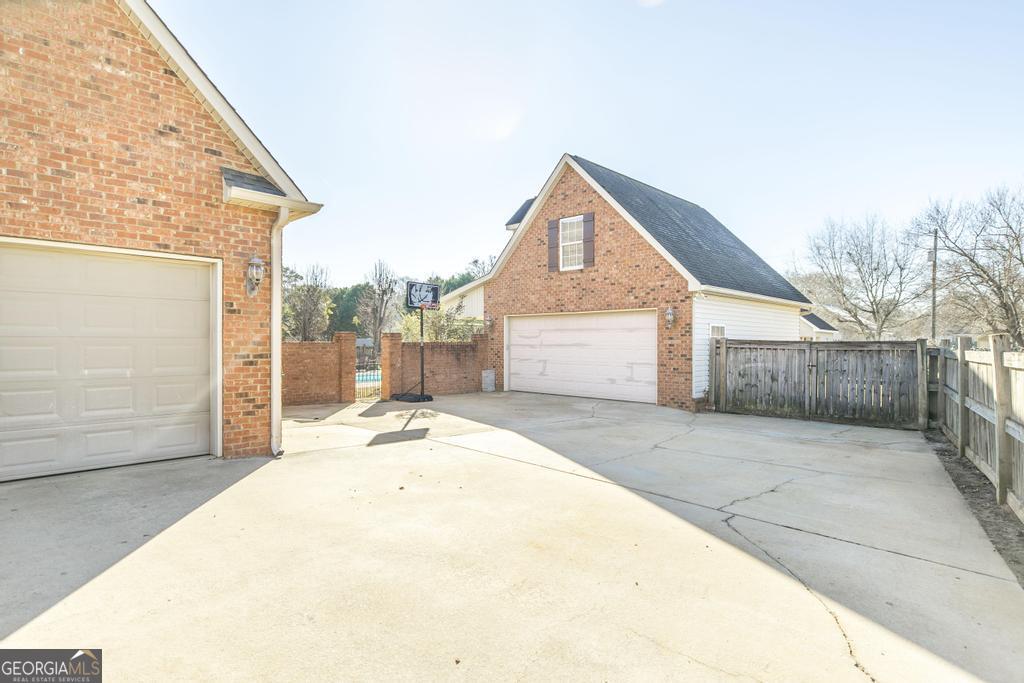 103 Westward Point Kathleen, GA 31047 - Photo 6 of 47 a front view of a house with a yard