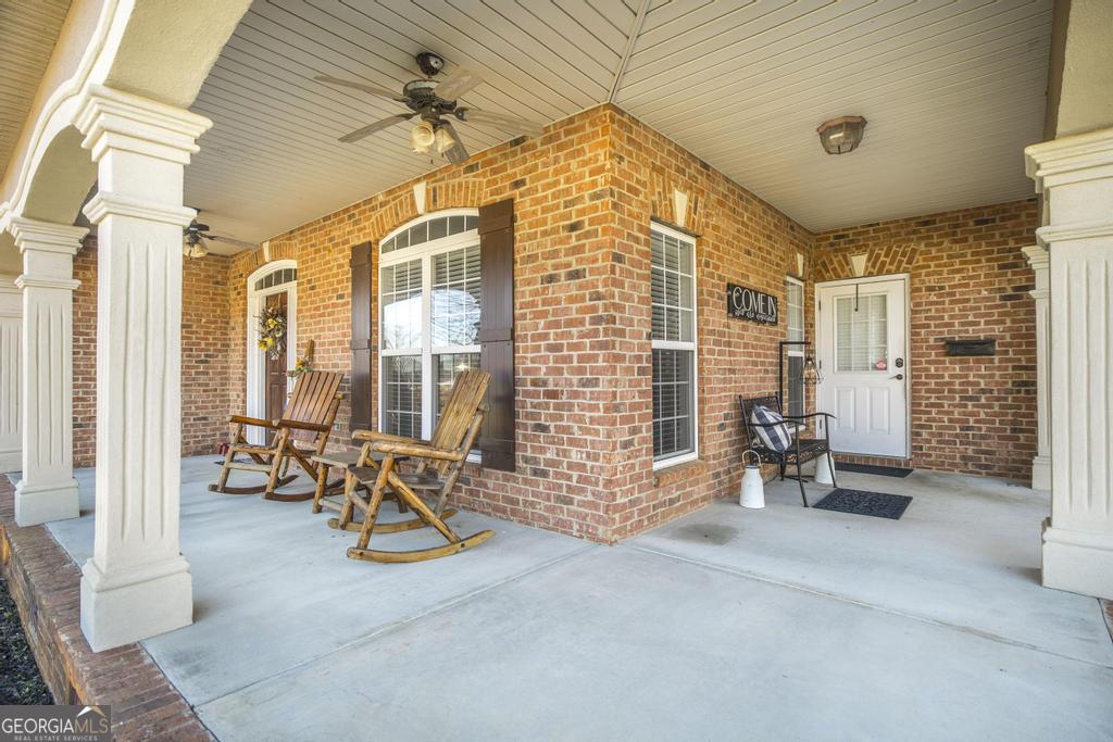 103 Westward Point Kathleen, GA 31047 - Photo 7 of 47 a view of a livingroom with furniture and a window