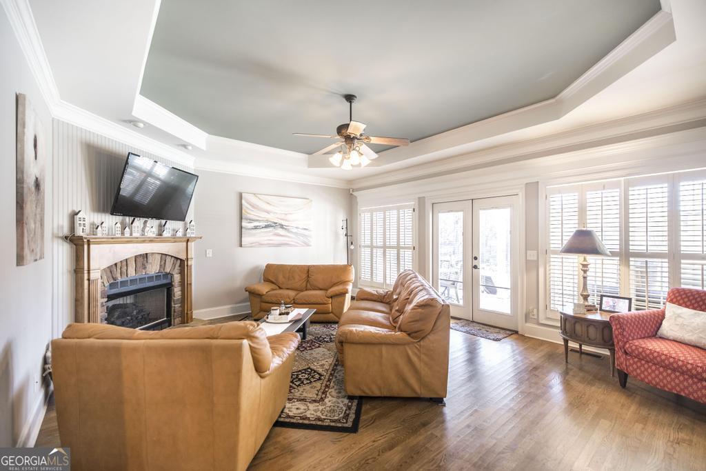 103 Westward Point Kathleen, GA 31047 - Photo 10 of 47 a living room with furniture a fireplace and a flat screen tv