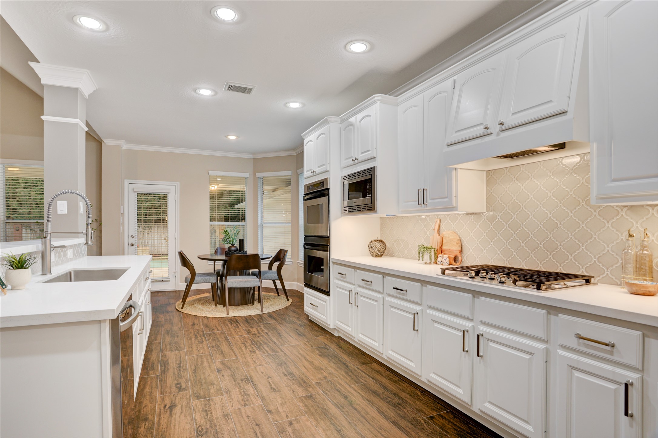 24418 Falcon Point Drive Katy, TX 77494 - Photo 10 of 40 a large kitchen with cabinets