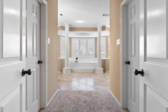 a bathroom with a glass door shower