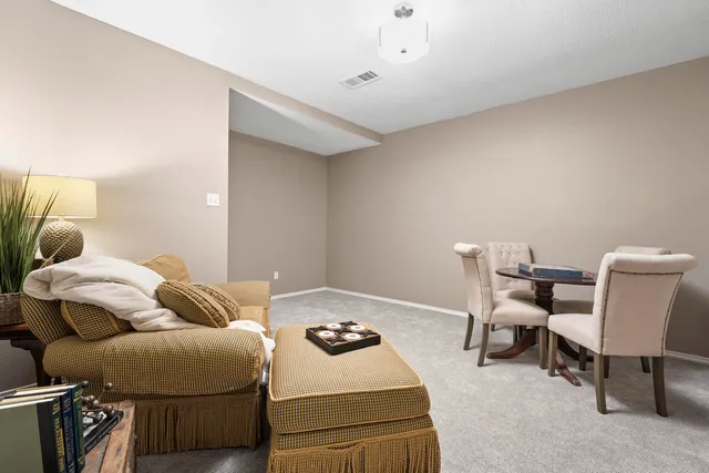 a kitchen with cabinets appliances and a counter