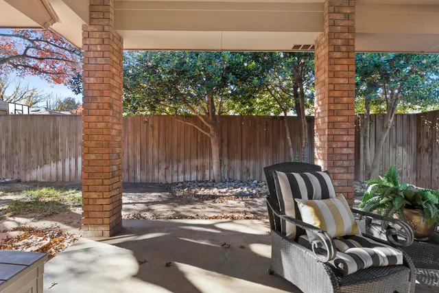 a workspace with furniture and a window