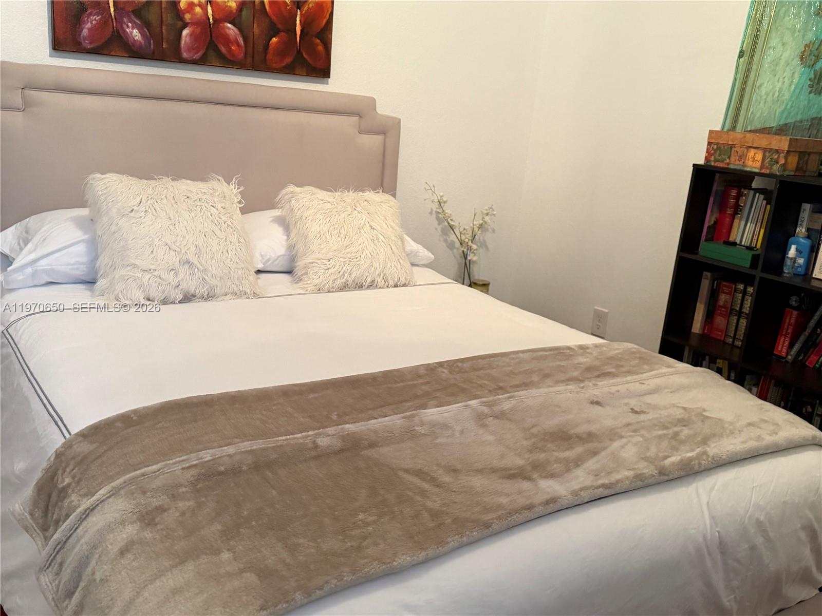 17012 Southwest 91st Street Miami, FL 33196 - Photo 19 of 22 a bedroom with a bed and closet