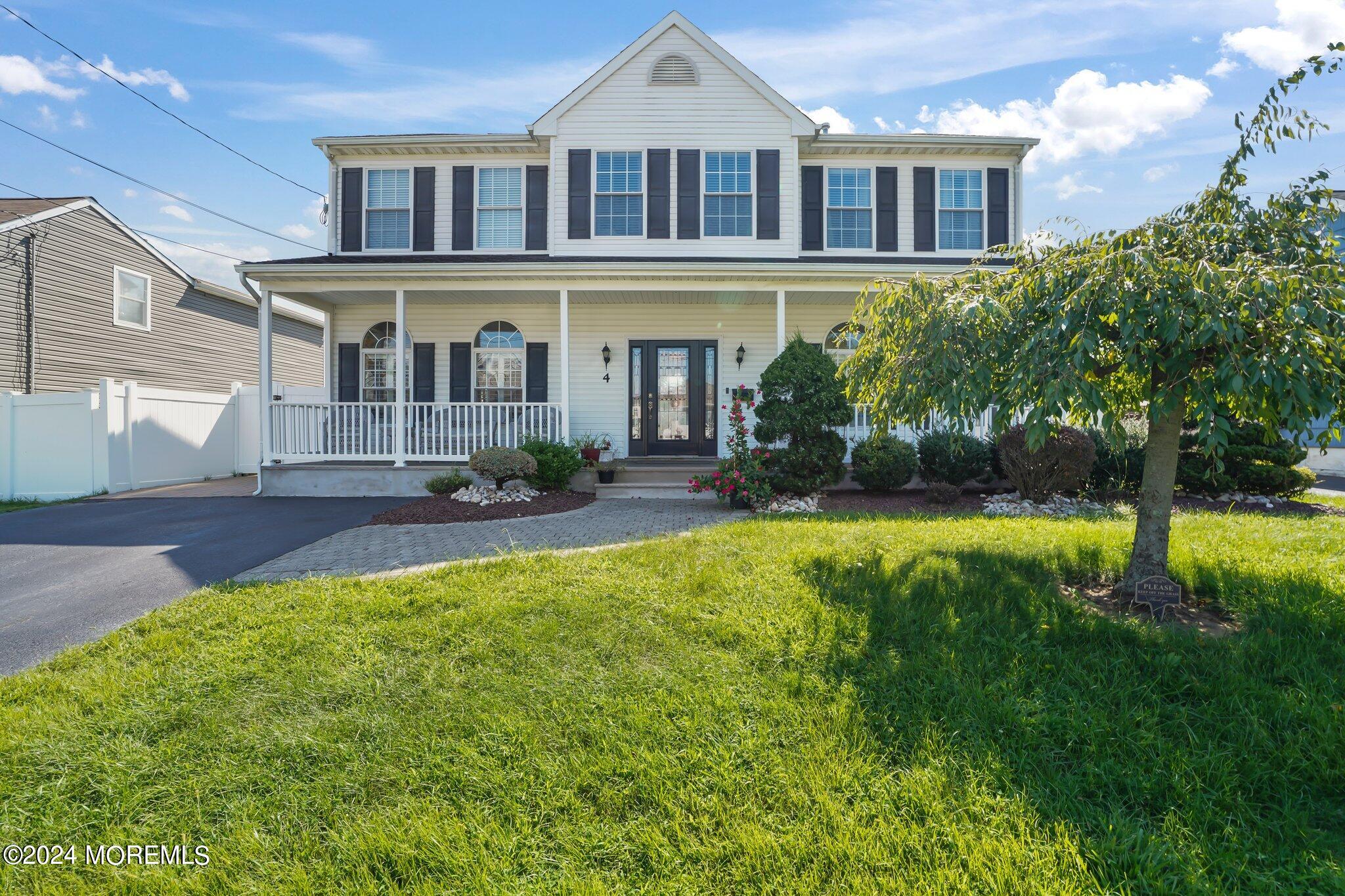 4 Anderson Street Union Beach, NJ 07735 - Photo 1 of 51 a front view of a house with swimming pool