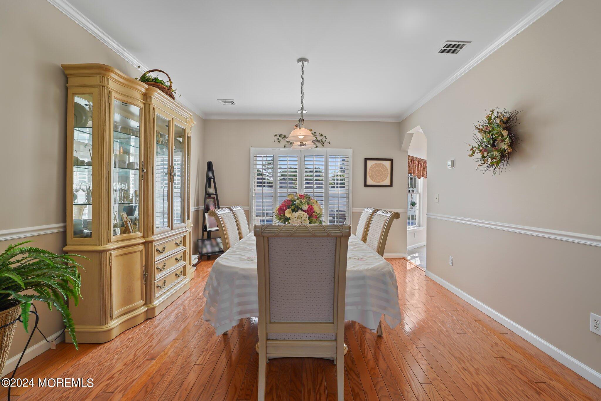 4 Anderson Street Union Beach, NJ 07735 - Photo 18 of 51 a view of a dining room with furniture window and wooden floor