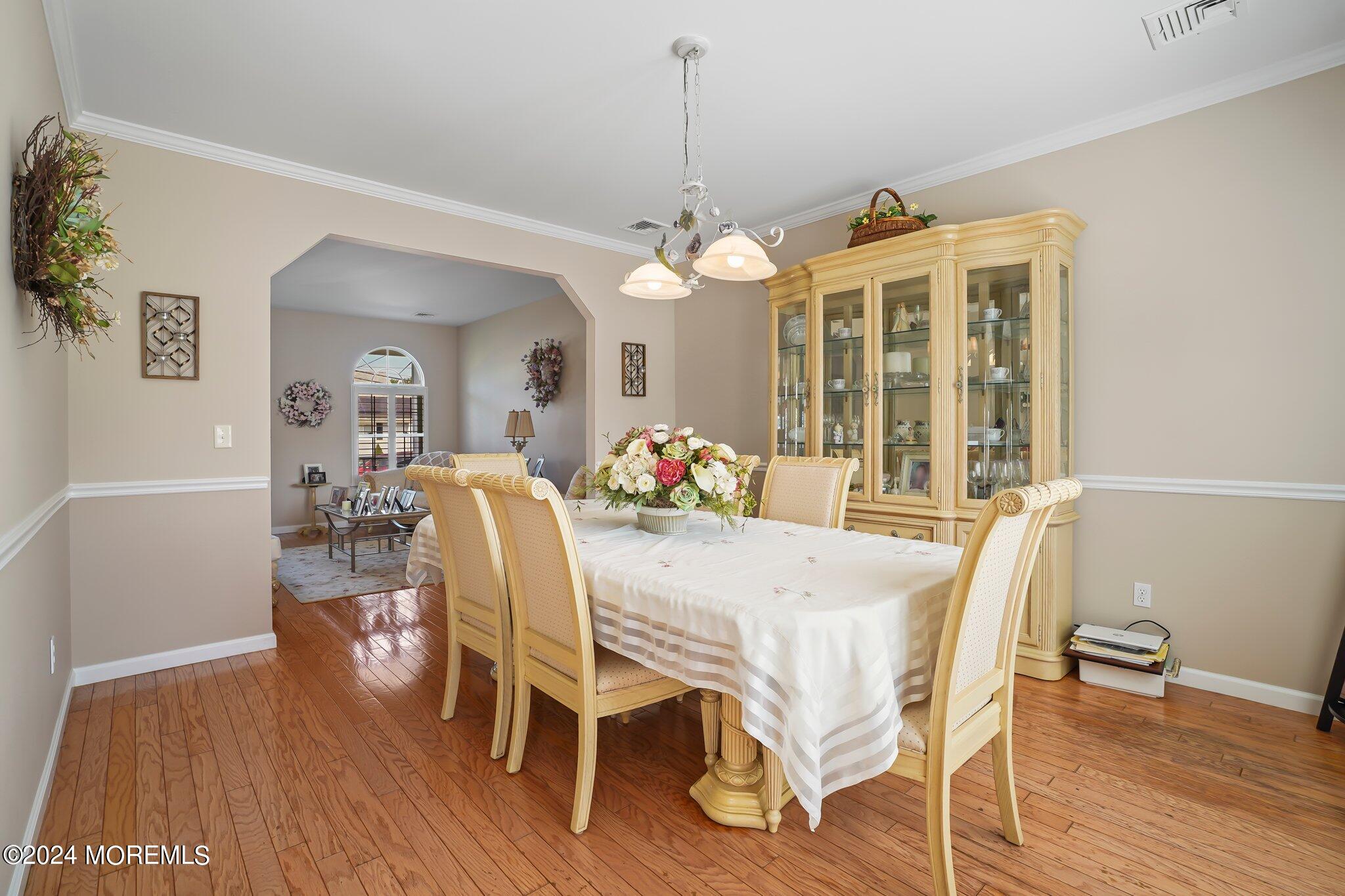 4 Anderson Street Union Beach, NJ 07735 - Photo 19 of 51 a view of a dining room with furniture window and wooden floor