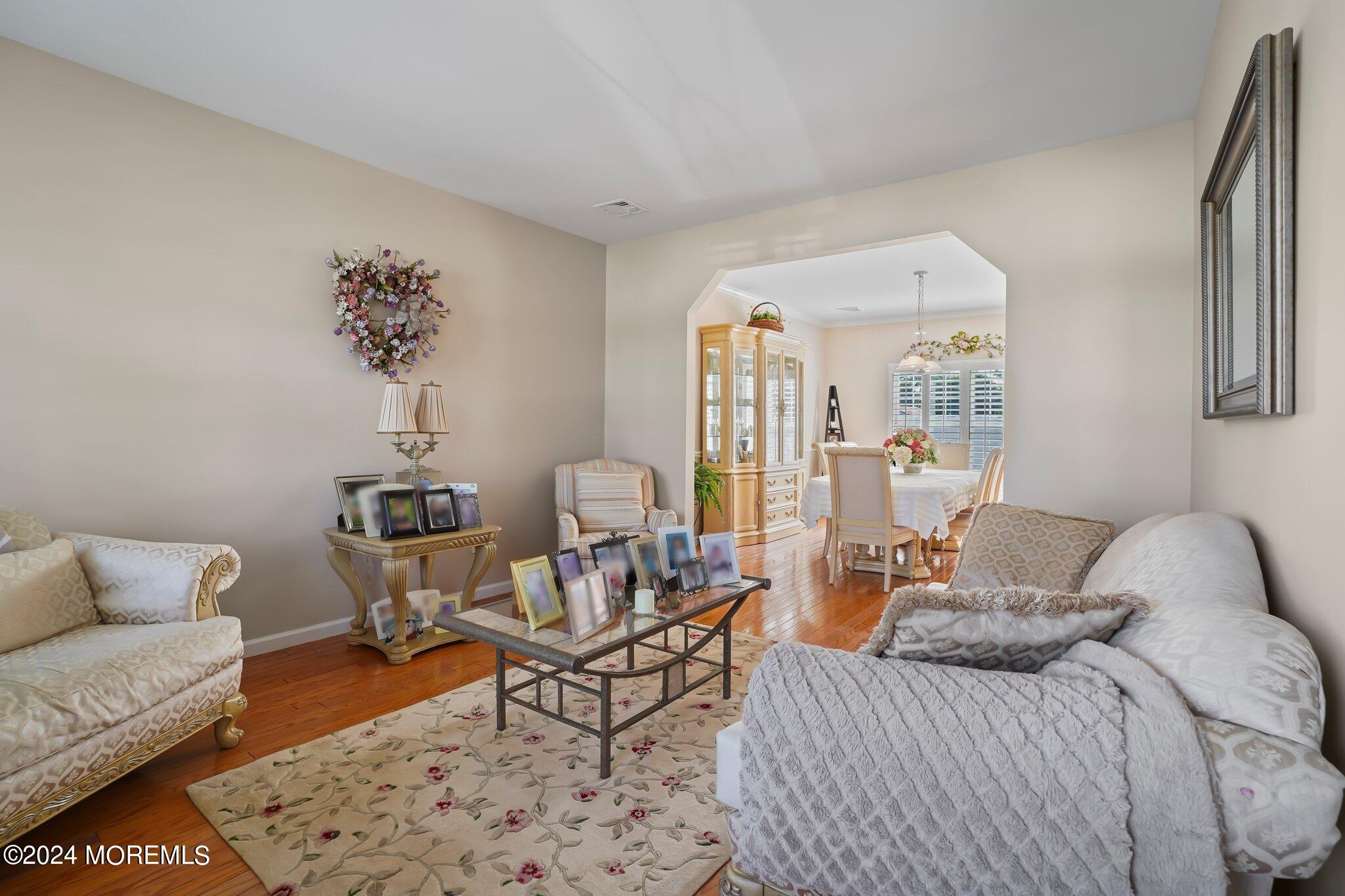 4 Anderson Street Union Beach, NJ 07735 - Photo 20 of 51 a living room with furniture and a potted plant