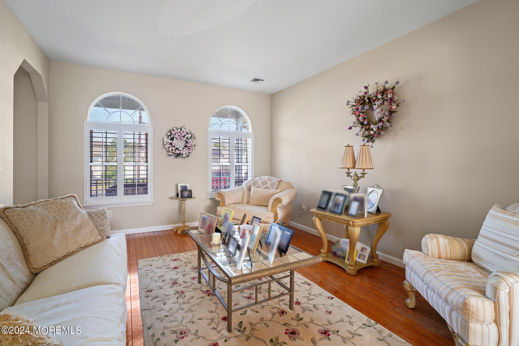 4 Anderson Street Union Beach, NJ 07735 - Photo 21 of 51 a living room with furniture and a large window
