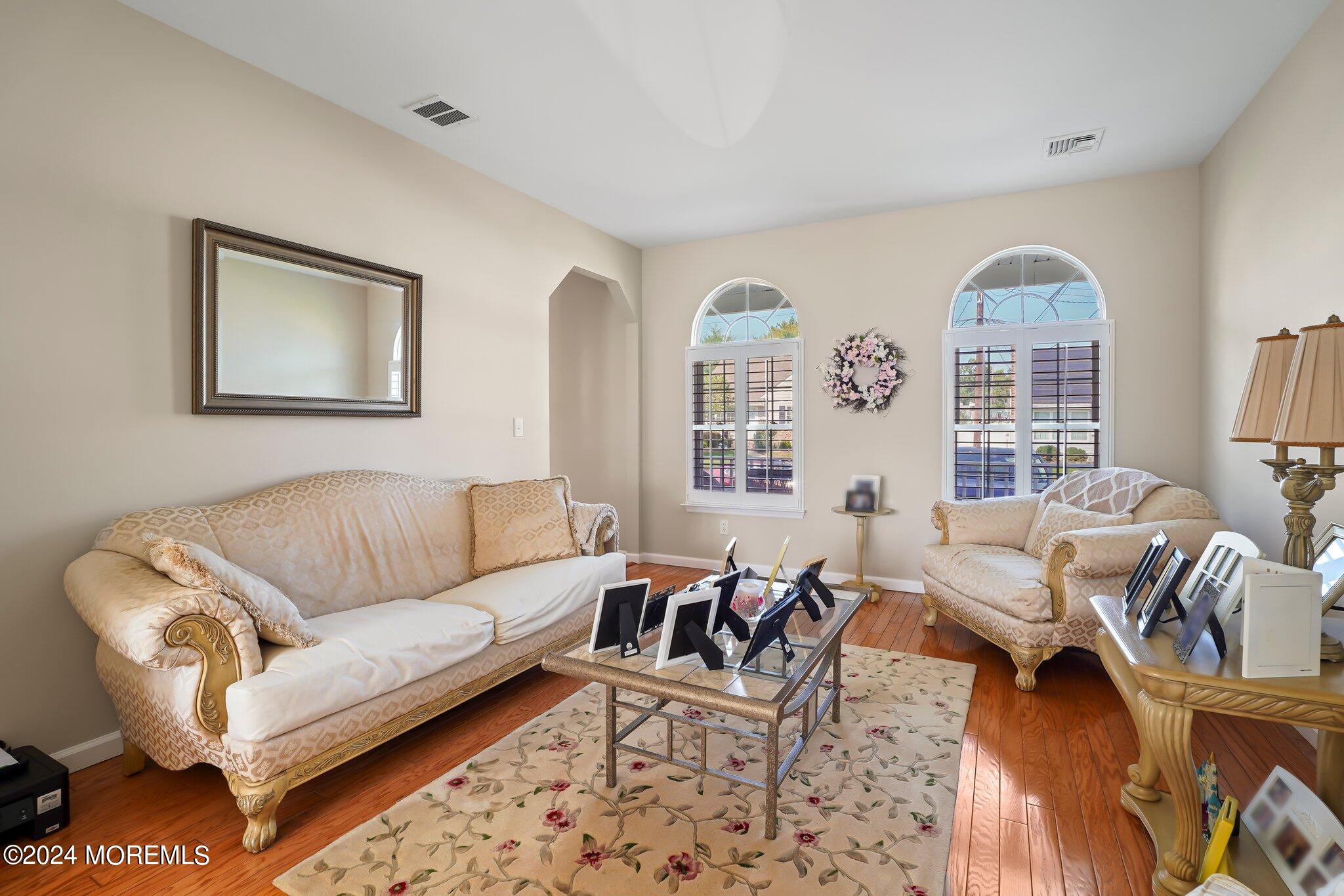 4 Anderson Street Union Beach, NJ 07735 - Photo 22 of 51 a living room with furniture and a large window