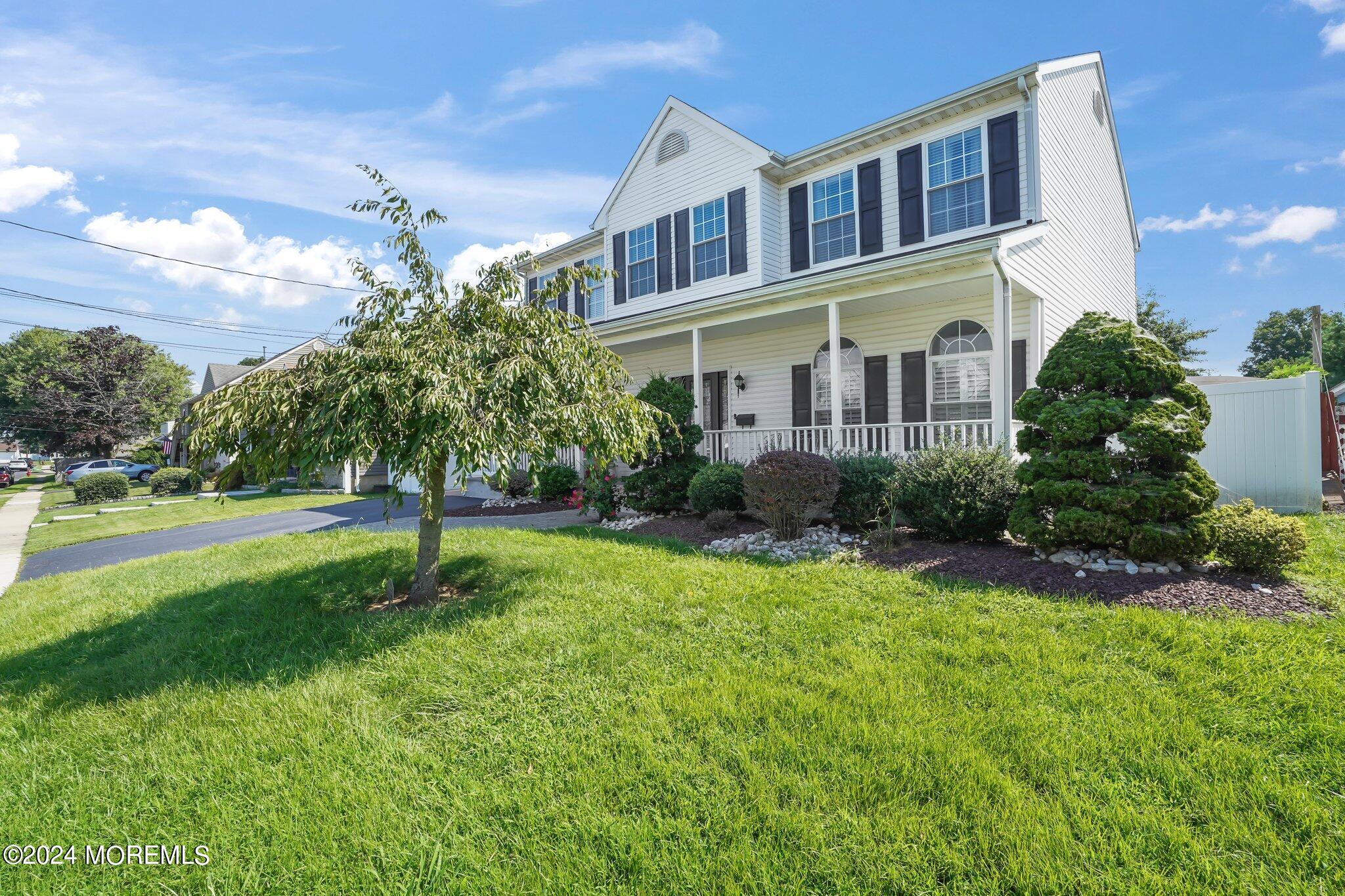 4 Anderson Street Union Beach, NJ 07735 - Photo 4 of 51 a front view of house with yard and green space