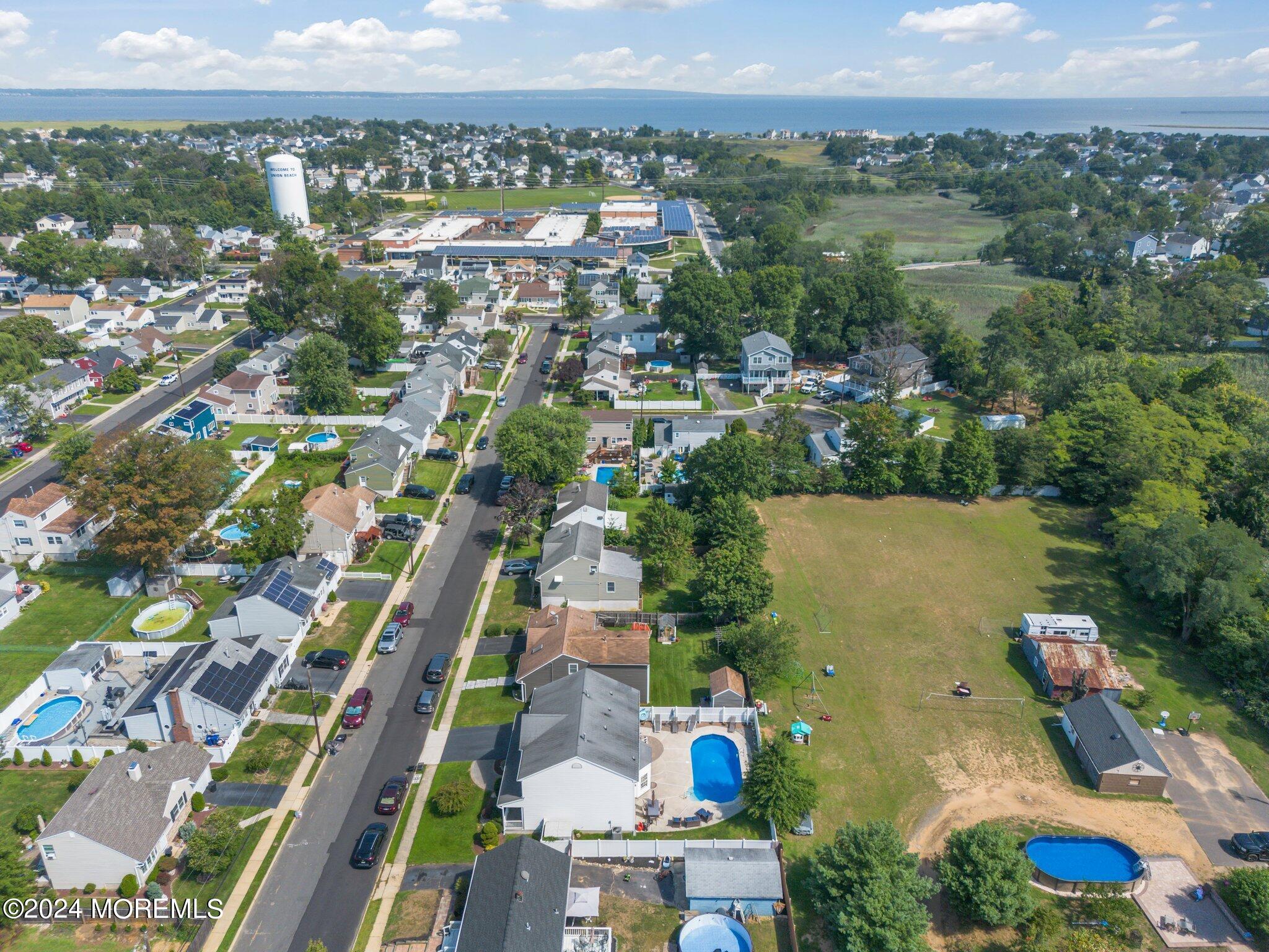 4 Anderson Street Union Beach, NJ 07735 - Photo 47 of 51 an aerial view of city and lake