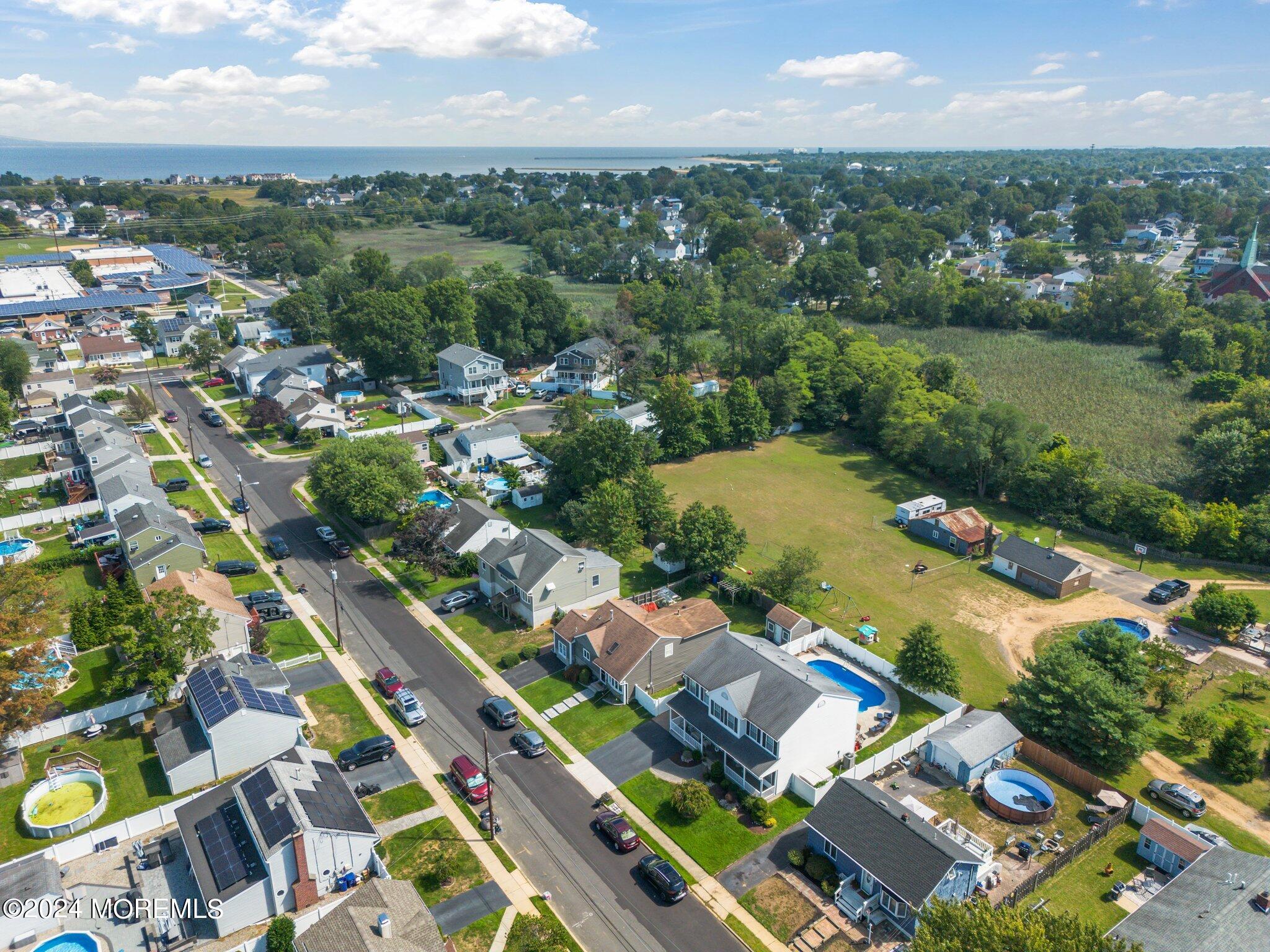 4 Anderson Street Union Beach, NJ 07735 - Photo 48 of 51 an aerial view of residential houses with outdoor space