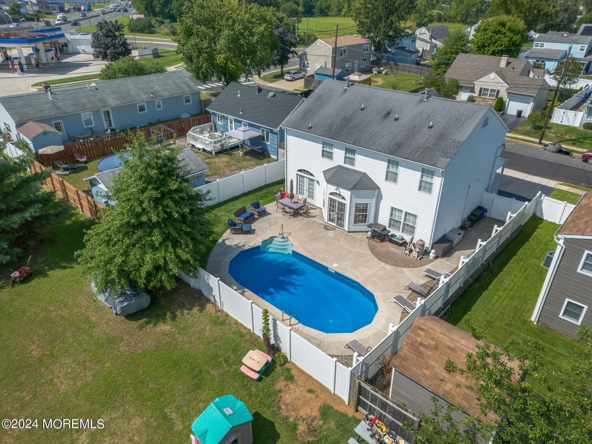 4 Anderson Street Union Beach, NJ 07735 - Photo 6 of 51 an aerial view of residential houses with outdoor space
