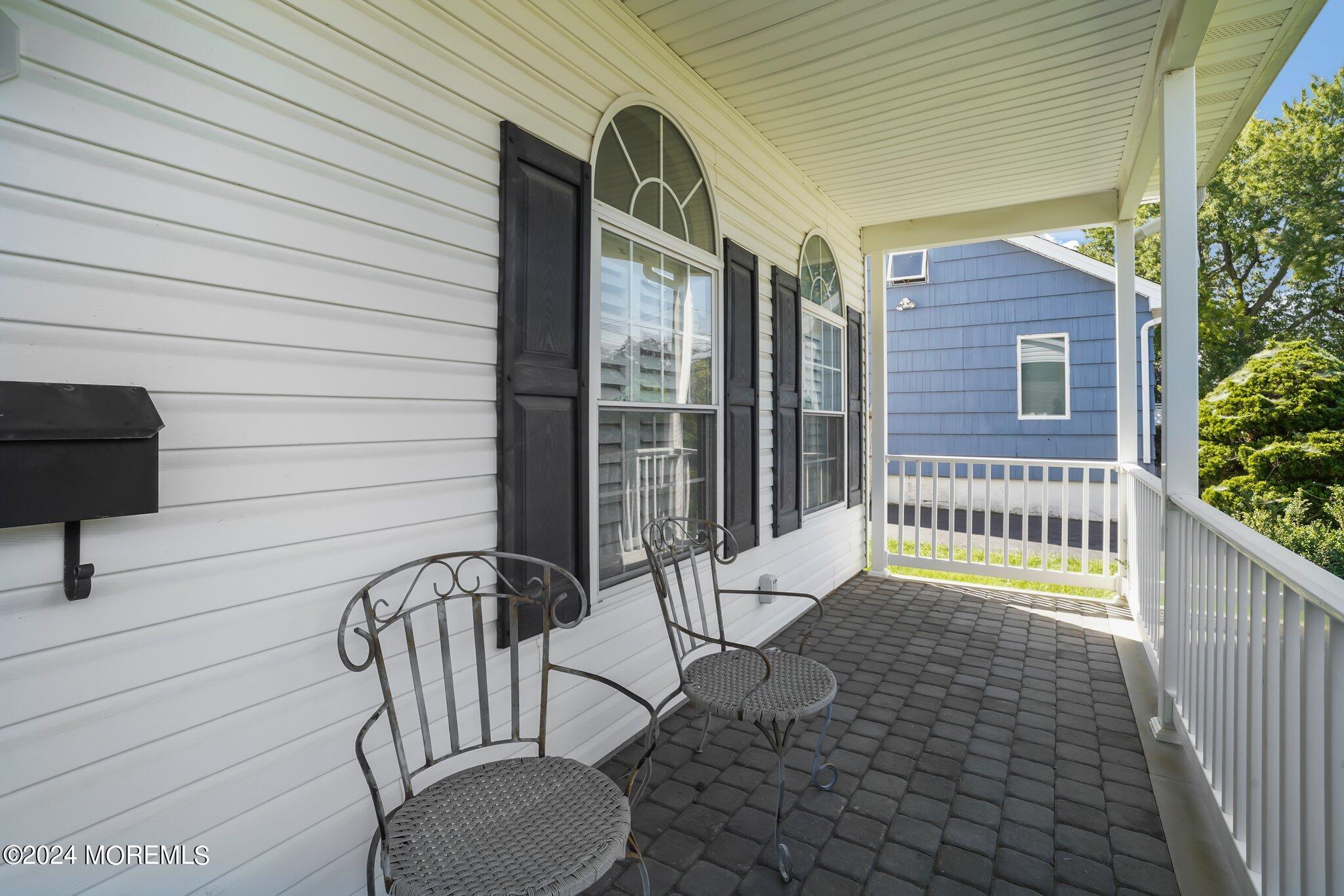 4 Anderson Street Union Beach, NJ 07735 - Photo 10 of 51 a view of a porch with furniture