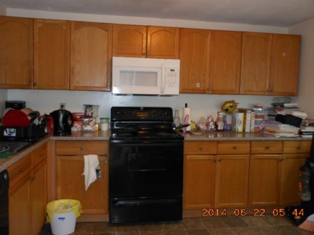 7 Padanaram Road, Unit 66 Danbury, CT 06811 - Photo 1 of 1 a kitchen with a sink and cabinets