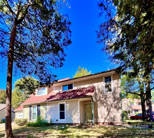 a view of a house with a swimming pool