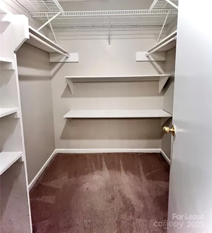 a bathroom with a double vanity sink and mirror