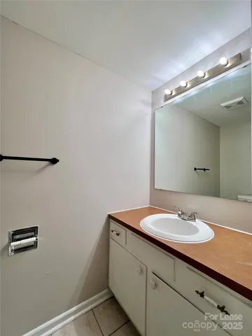 a view of a swimming pool with a yard