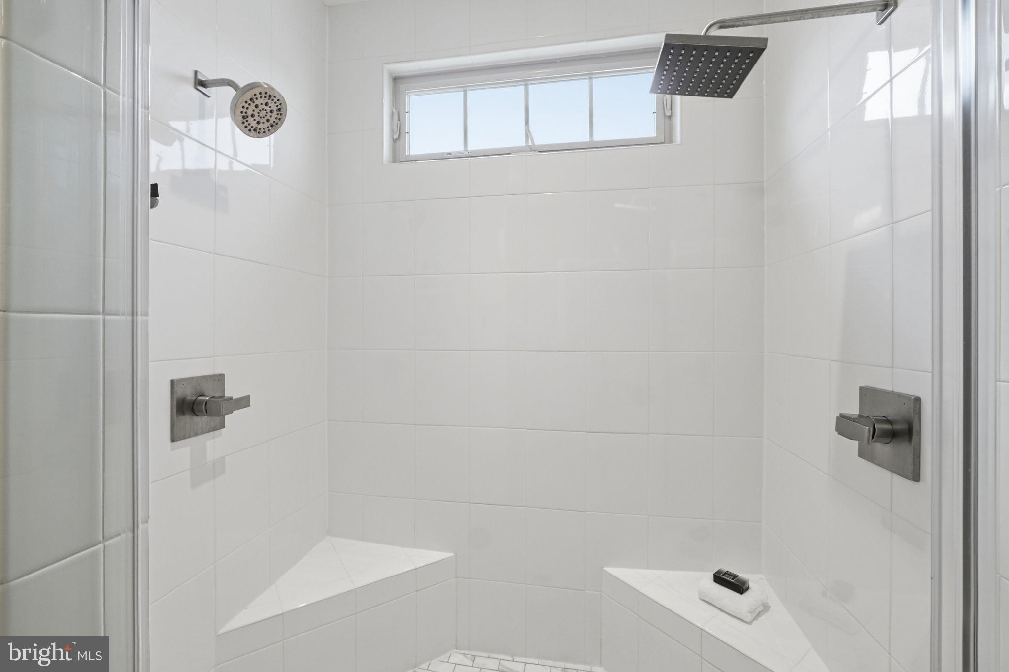 17812 Thomas Village Lane Sandy Spring, MD 20860 - Photo 23 of 37 a bathroom with a shower