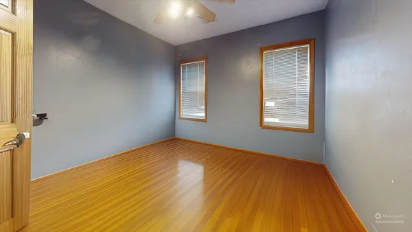 an empty room with windows