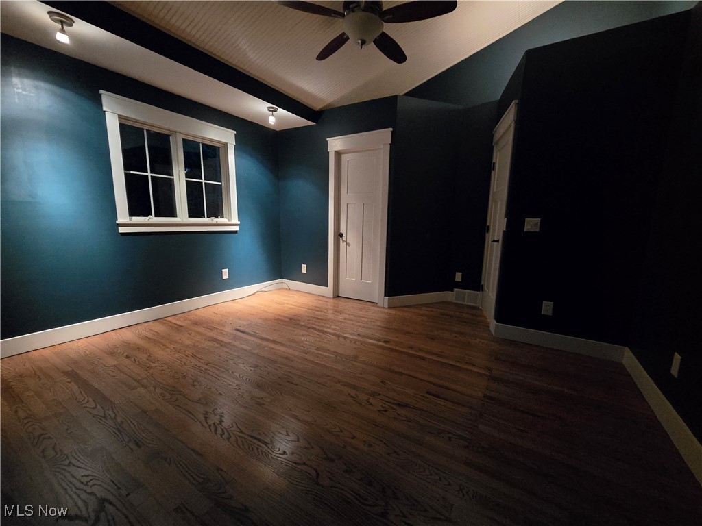 6155 Beach Road Wadsworth, OH 44281 - Photo 22 of 49 Master bedroom view featuring accent lighting, vaulted ceiling with fan, and hardwood flooring