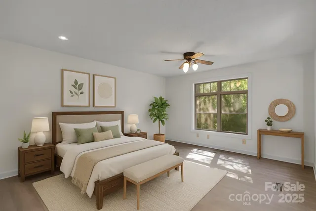 a bathroom with a granite countertop toilet a sink and shower