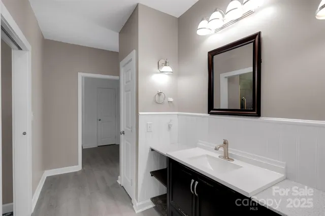 a outdoor view of a house with a yard and covered with snow