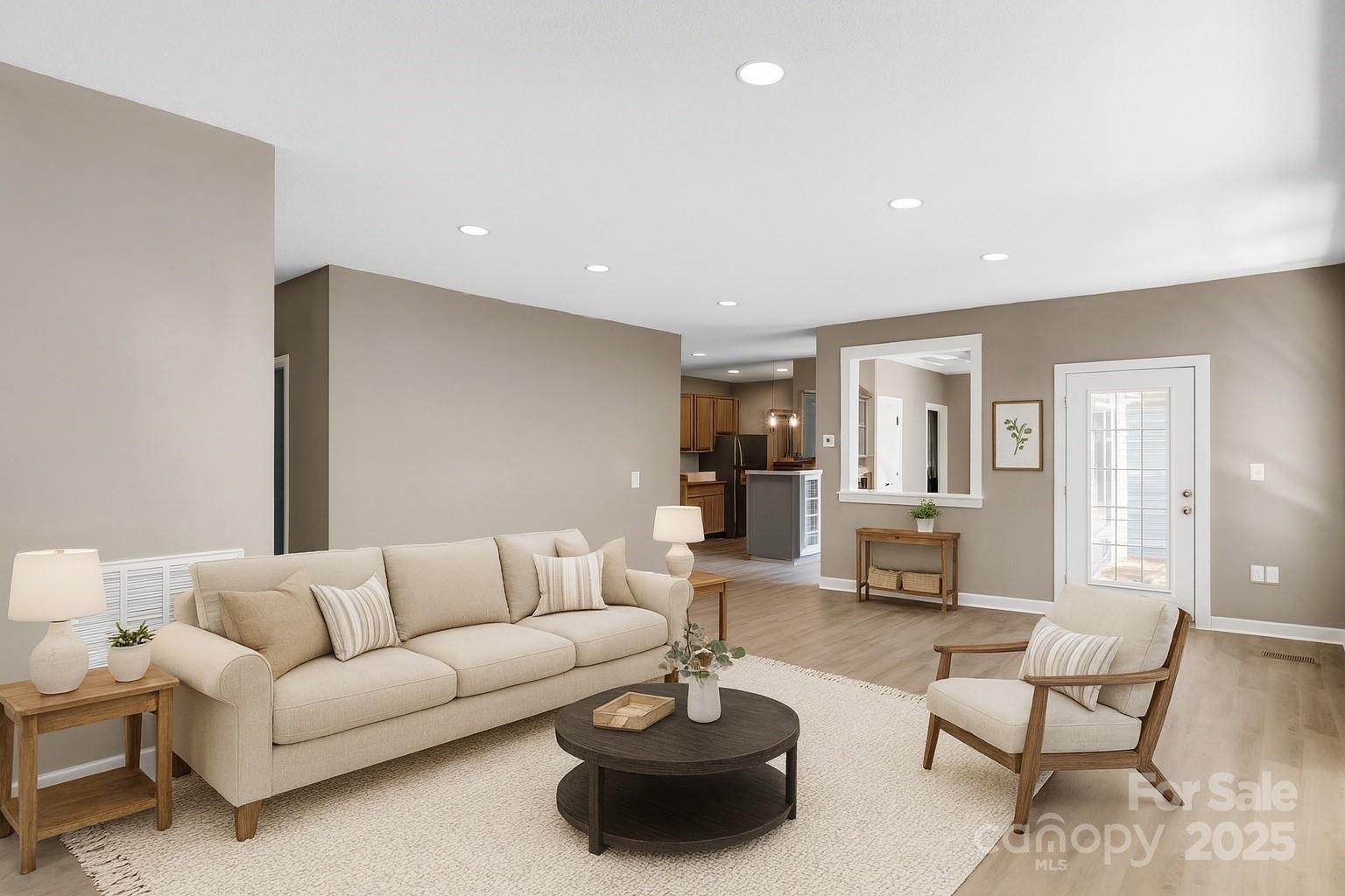 3333 Roberta Road Concord, NC 28027 - Photo 10 of 47 a living room with furniture and a wooden floor