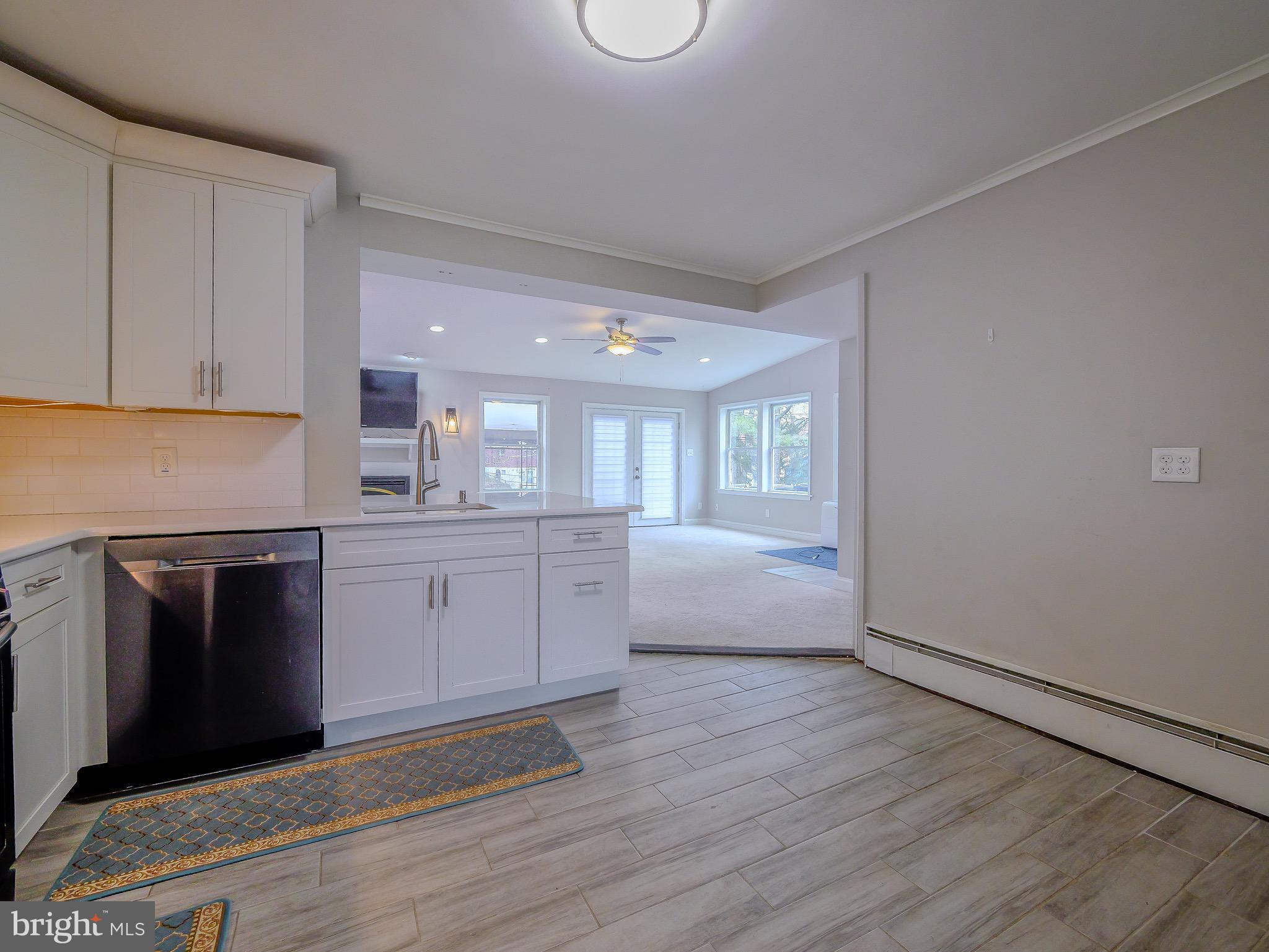 520 Lindsay Street Ridley Park, PA 19078 - Photo 11 of 53 a open kitchen with a sink and dishwasher stove top oven