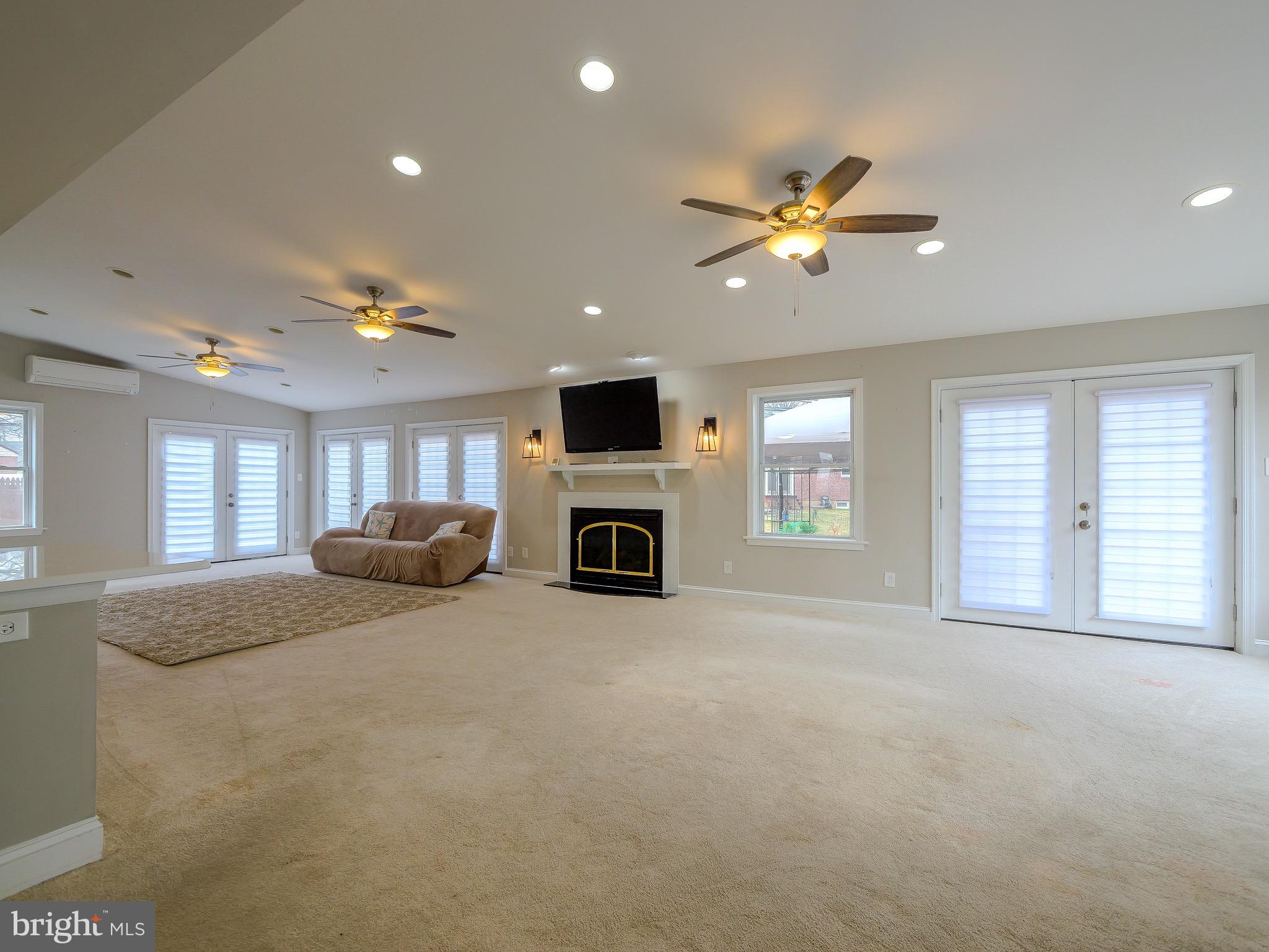 520 Lindsay Street Ridley Park, PA 19078 - Photo 13 of 53 a living room with furniture and a fireplace
