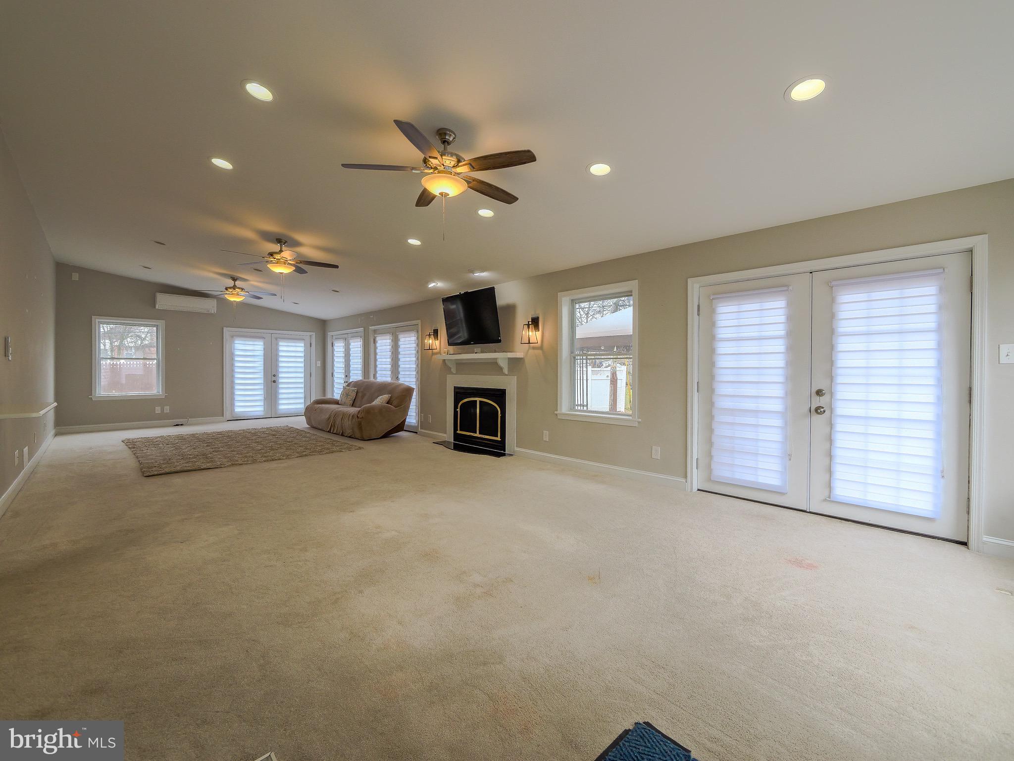 520 Lindsay Street Ridley Park, PA 19078 - Photo 14 of 53 a living room with furniture and a ceiling fan