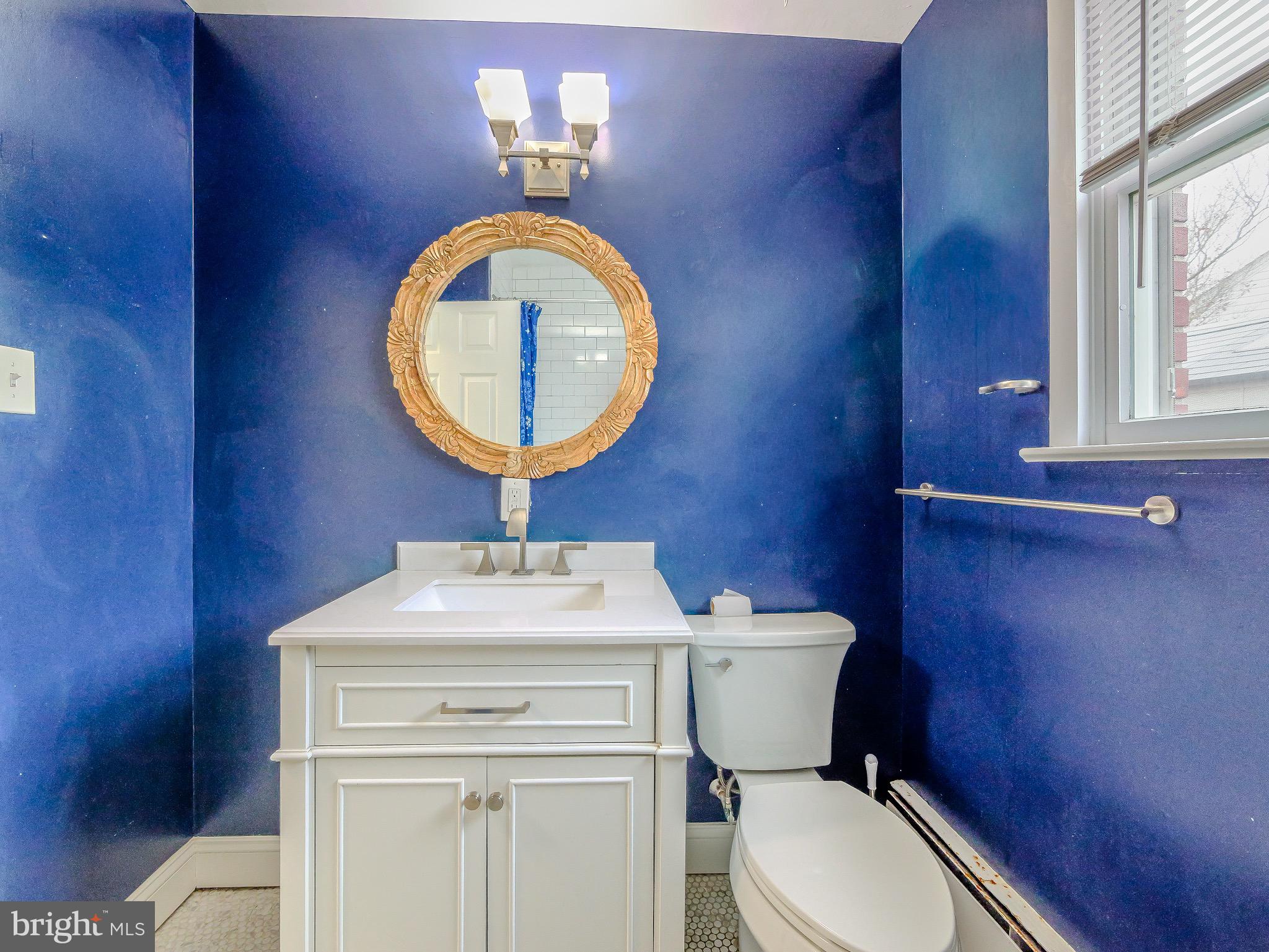 520 Lindsay Street Ridley Park, PA 19078 - Photo 26 of 53 a bathroom with a sink mirror vanity and toilet