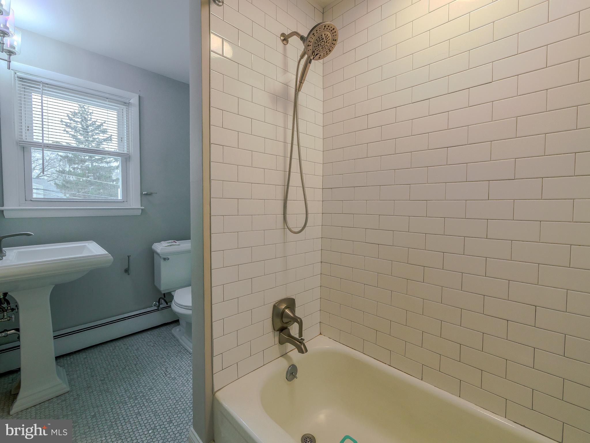 520 Lindsay Street Ridley Park, PA 19078 - Photo 33 of 53 a bathroom with a sink a toilet and shower