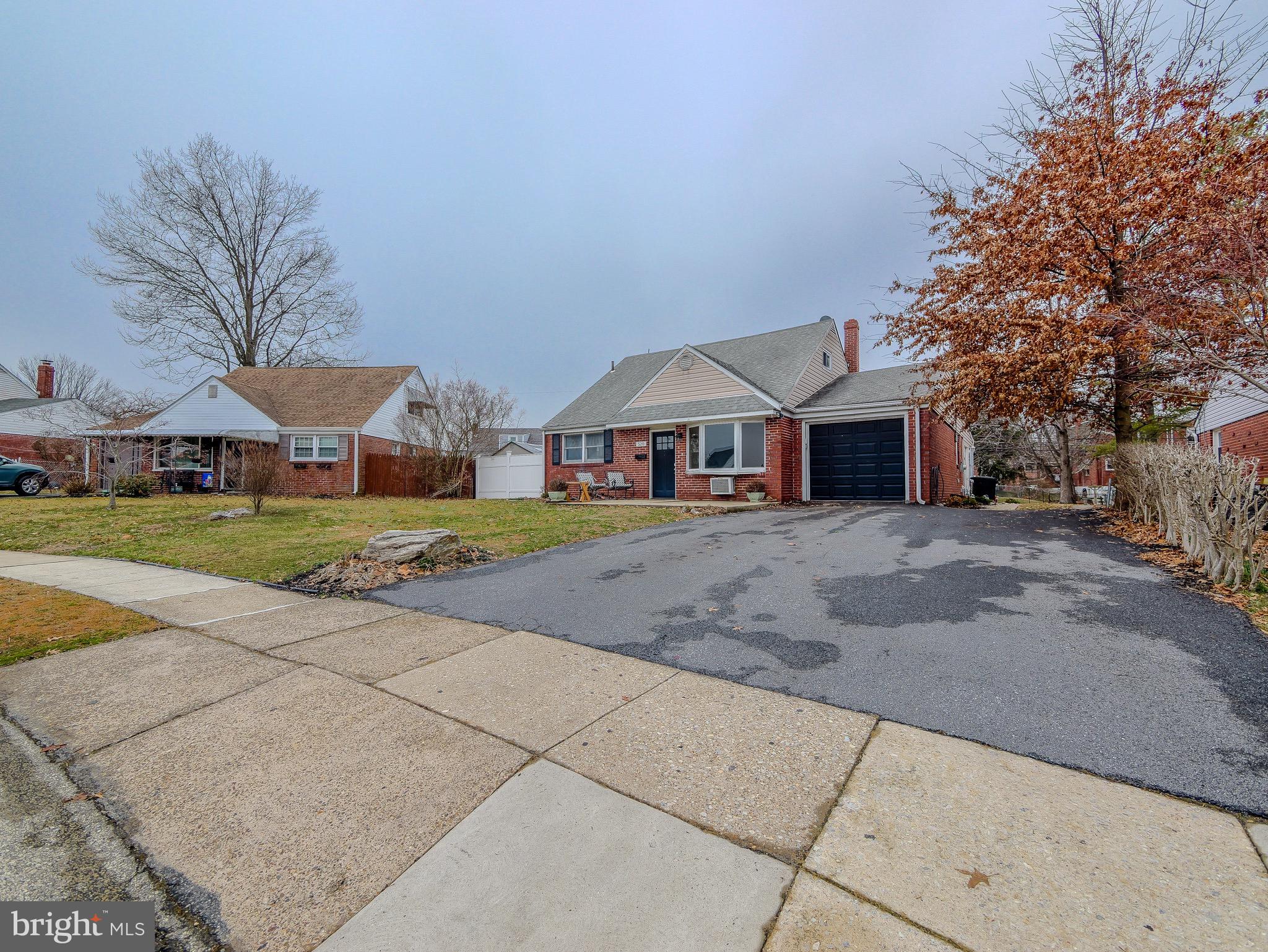 520 Lindsay Street Ridley Park, PA 19078 - Photo 51 of 53 a front view of house with yard and green space