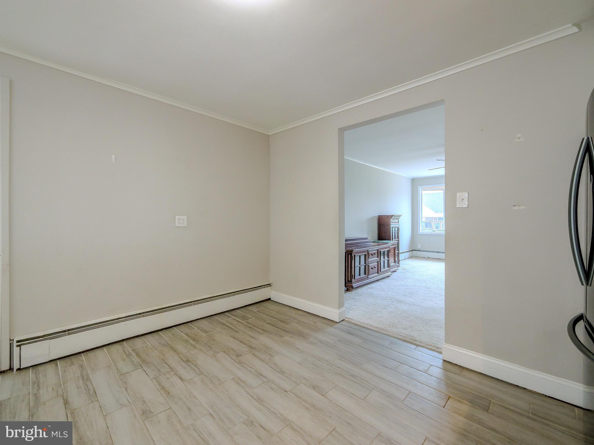 520 Lindsay Street Ridley Park, PA 19078 - Photo 10 of 53 a view of a room with wooden floor