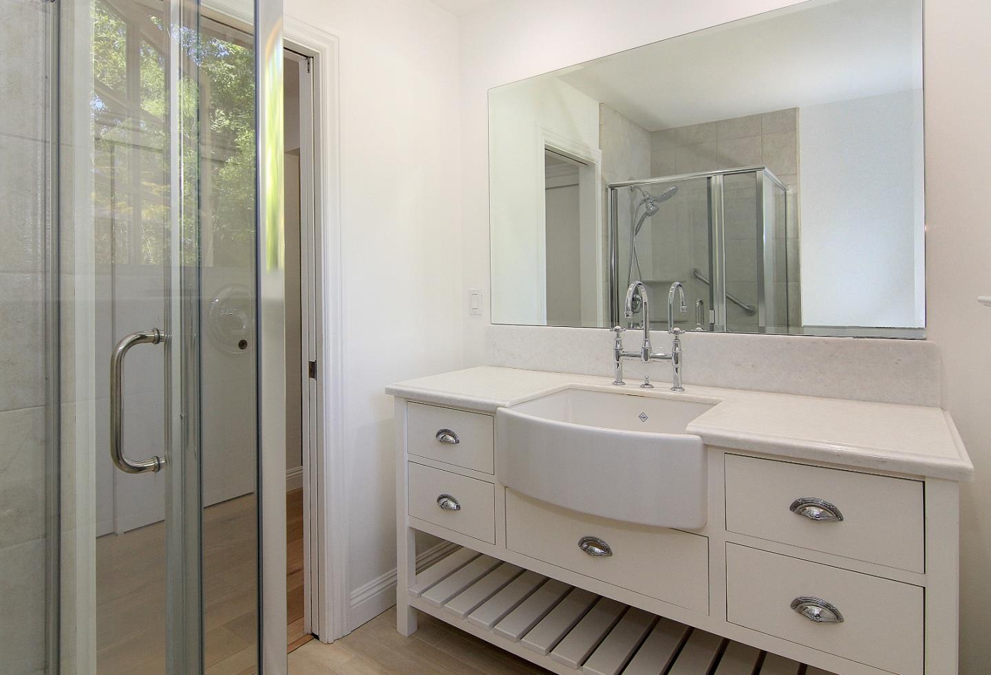 155 Wheelock Road Watsonville, CA 95076 - Photo 15 of 36 a bathroom with a sink and mirror