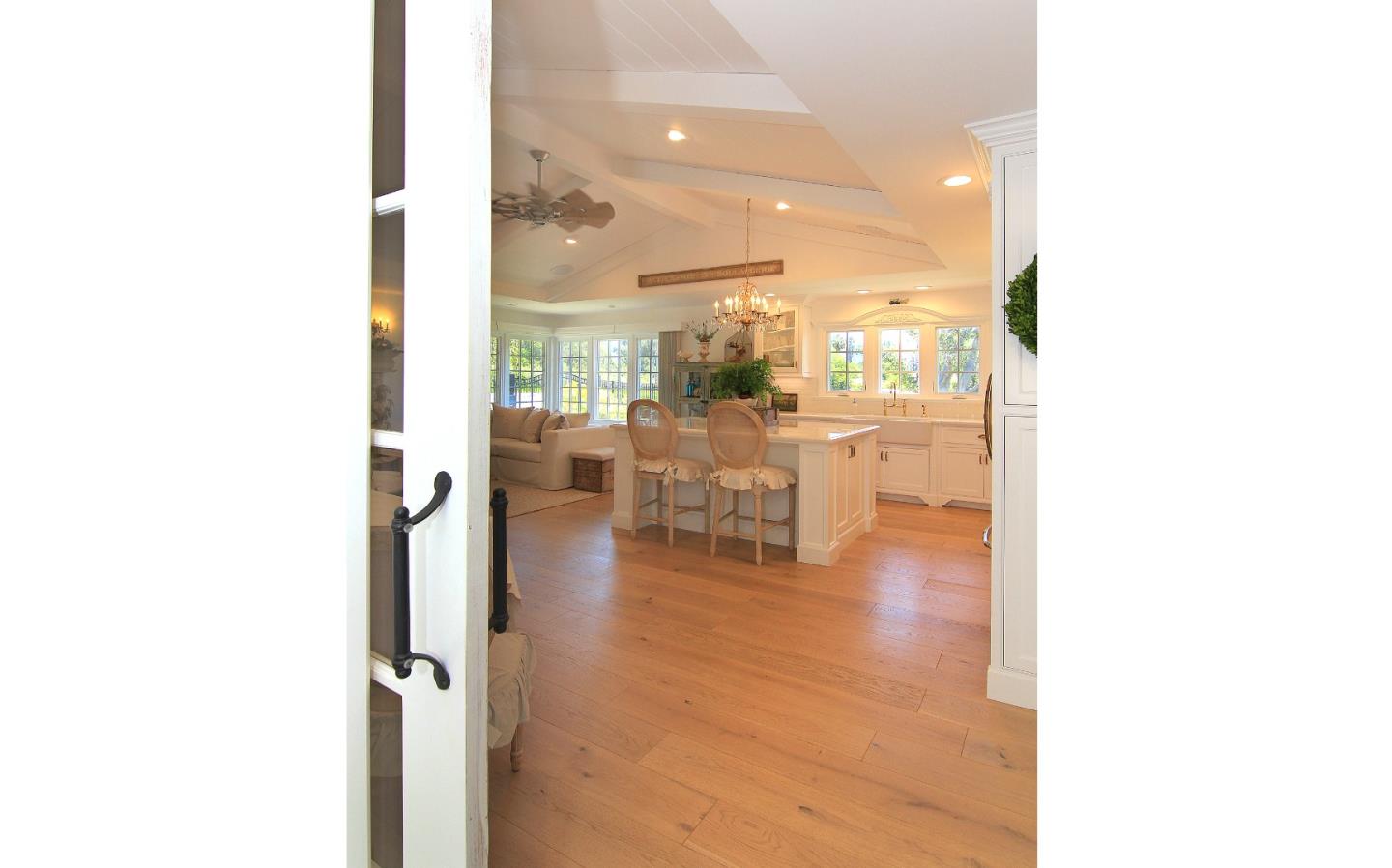 155 Wheelock Road Watsonville, CA 95076 - Photo 21 of 36 a view of a living room with a floor to ceiling window and kitchen