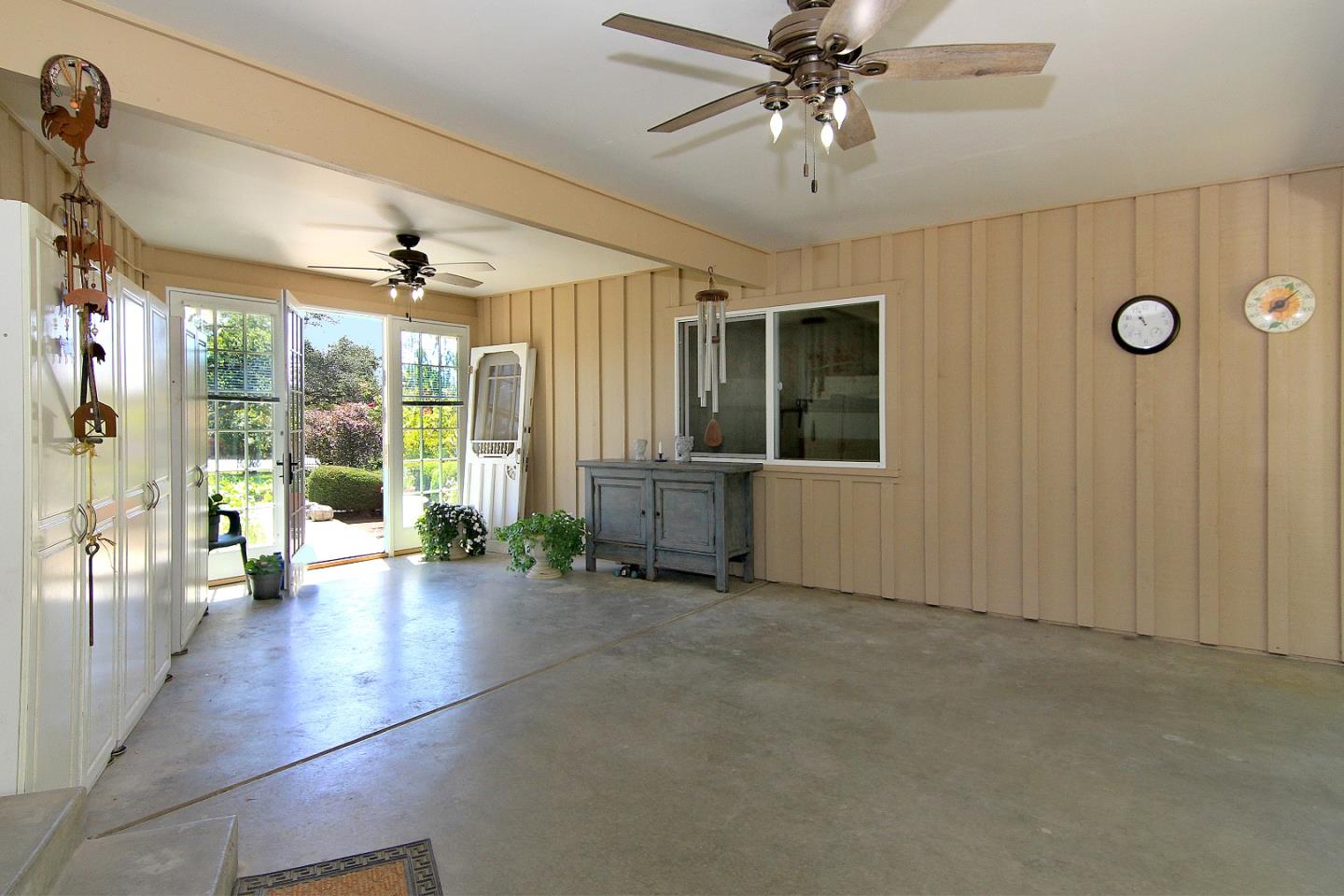 155 Wheelock Road Watsonville, CA 95076 - Photo 23 of 36 a view of a livingroom with a ceiling fan and window