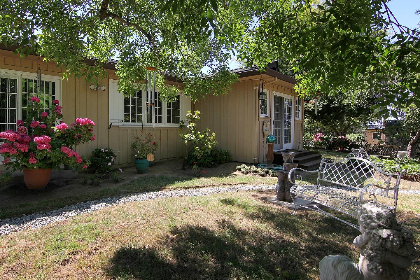 155 Wheelock Road Watsonville, CA 95076 - Photo 26 of 36 a backyard of a house with yard barbeque oven and outdoor seating
